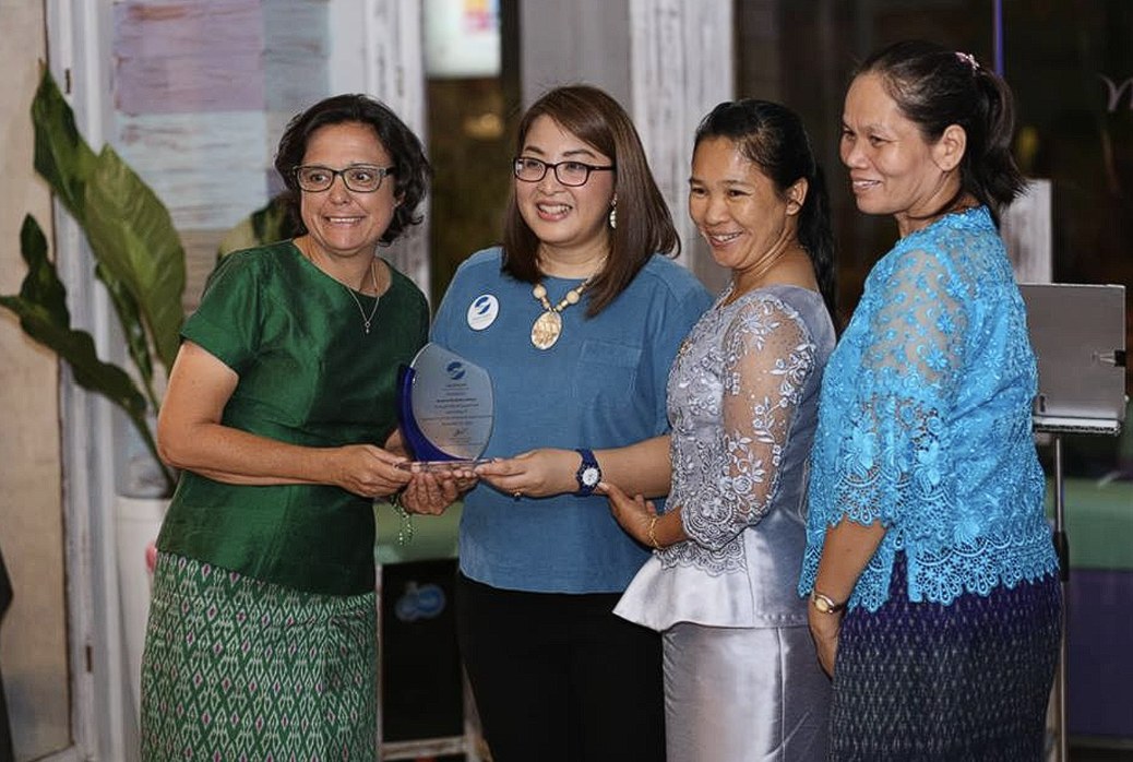 Hand to Hand receiving a partnership award alongside local government and community representatives