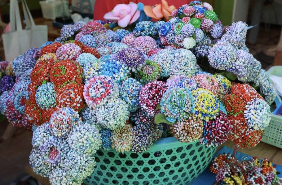 Colourful flowers handmade from recycled plastic by Hand to Hand micro enterprise participants