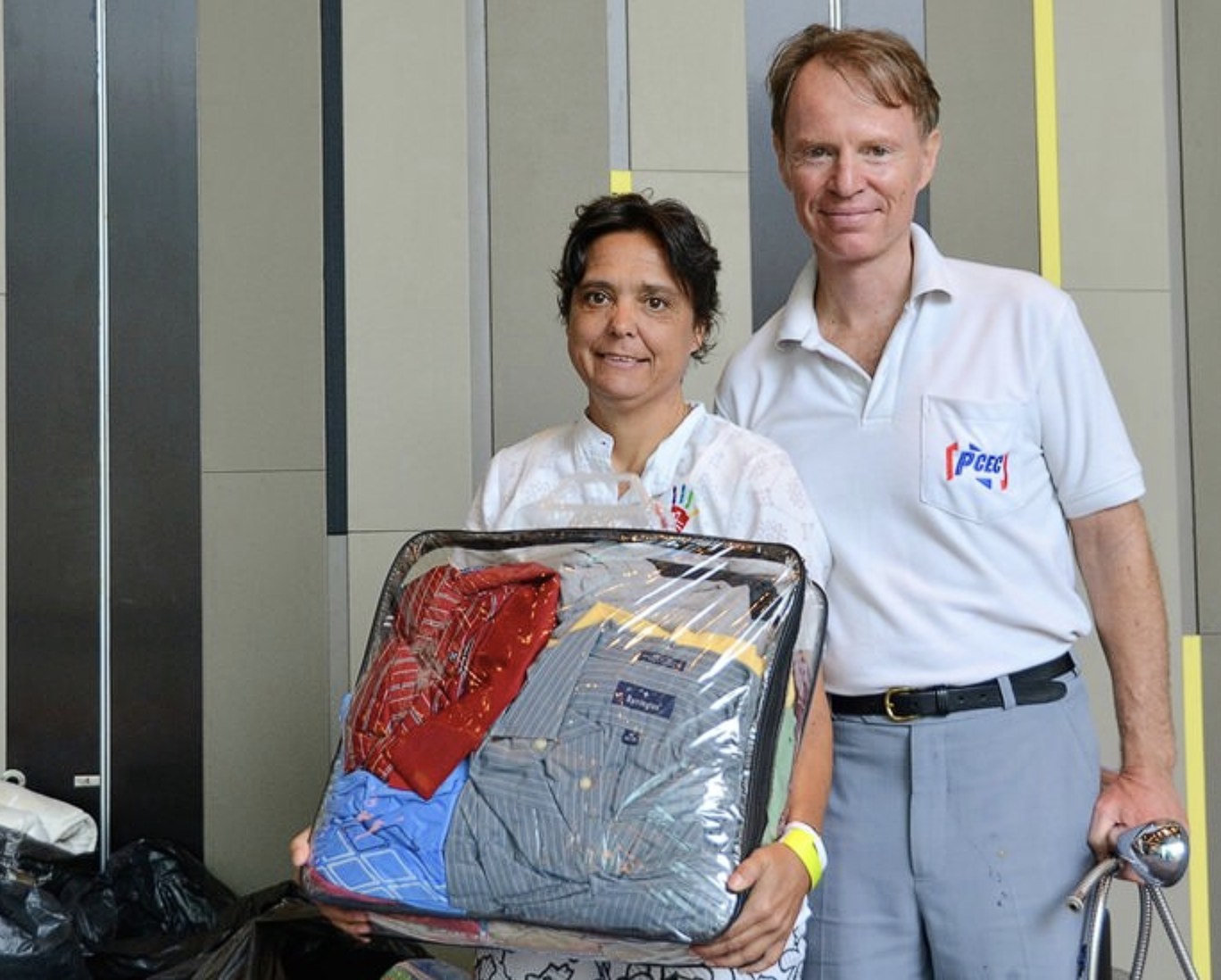 Margie Grainger with a PCEC volunteer delivering donated clothing for Hand to Hand