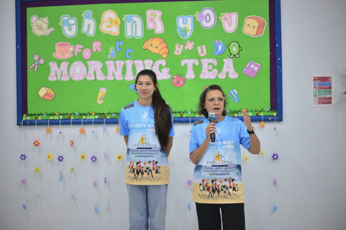 Hand to Hand staff speaking at a Thank You Morning Tea event